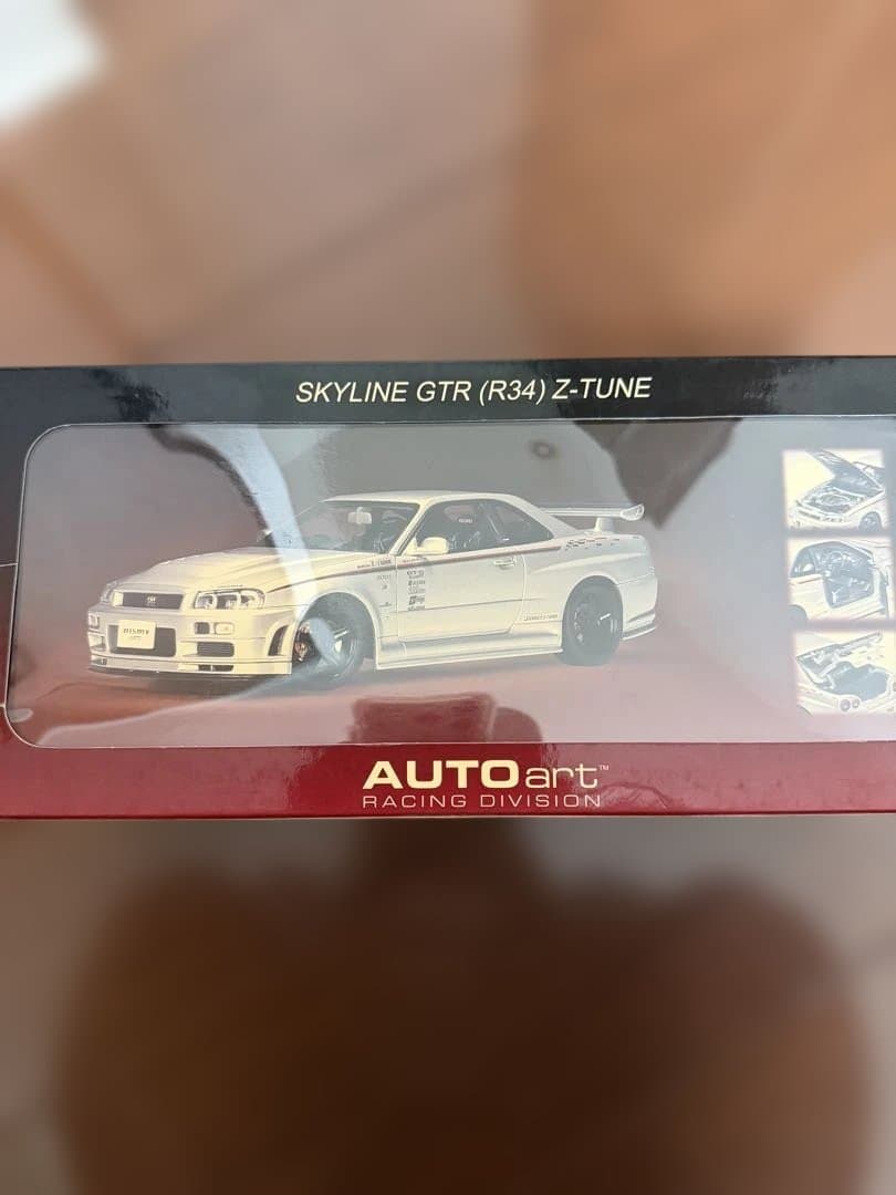 ミニカー NISMO SKYLINE GT-R R34 Z tune 1:18