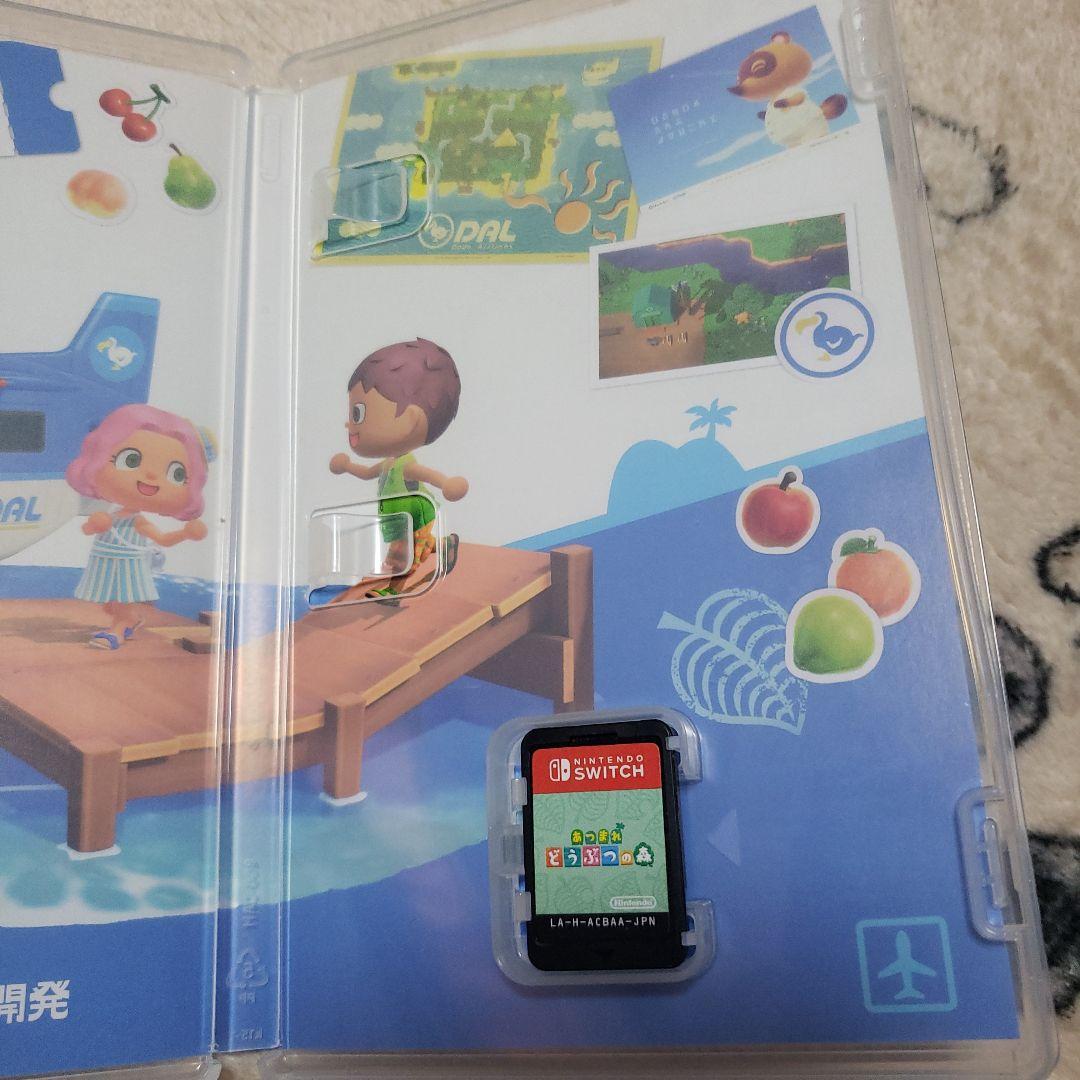 新品未開封NintendoSwitch 有機el＋どうぶつの森ソフト＋攻略本　②