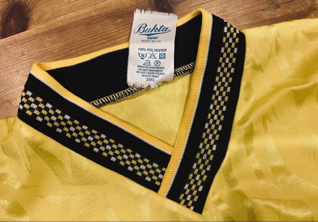 ユニフォーム 古着 90s Bukta バクタ UK製 黄色 Vネック 40