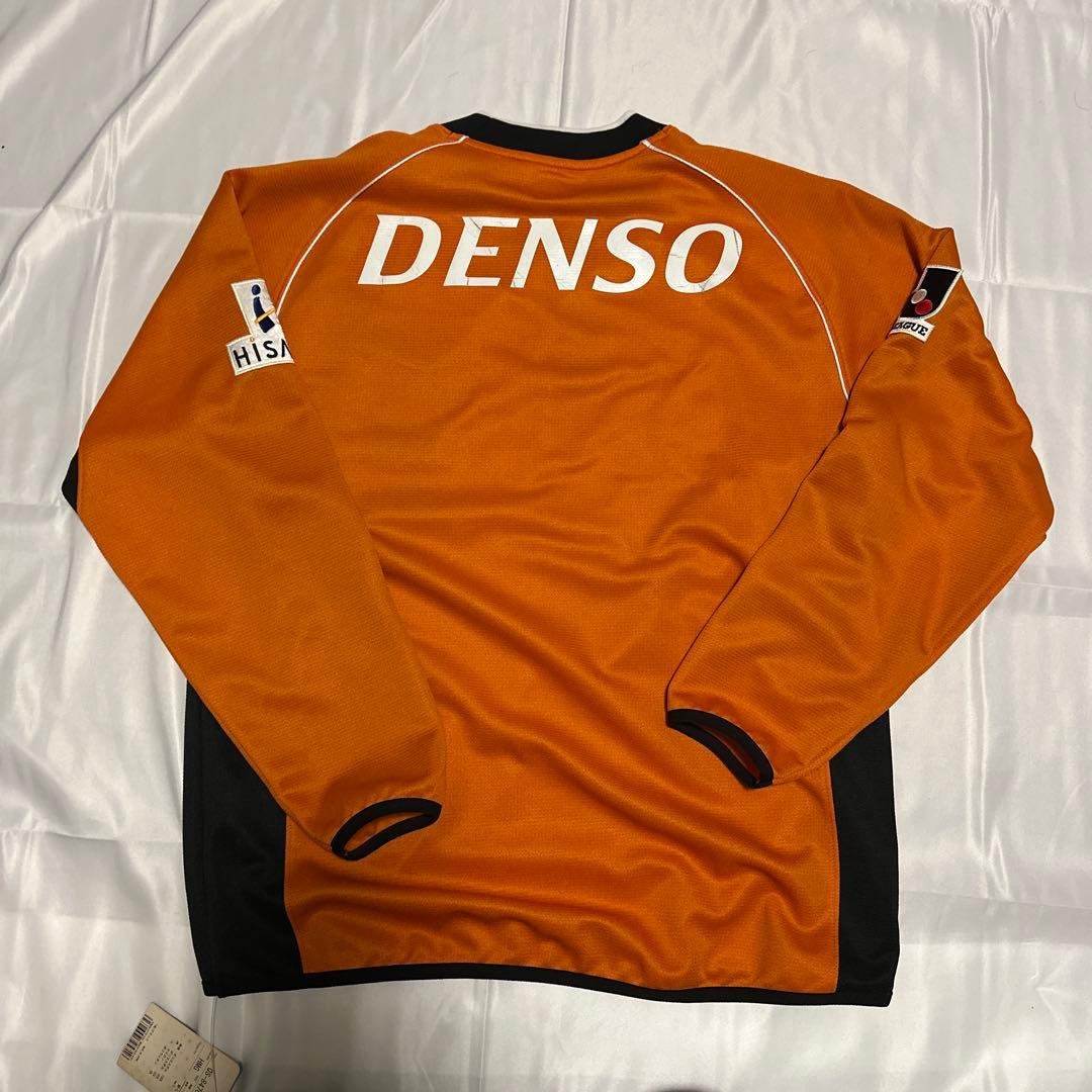 新品・タグ付き名古屋グランパス楢崎正剛GKユニフォームMサイズ オレンジ