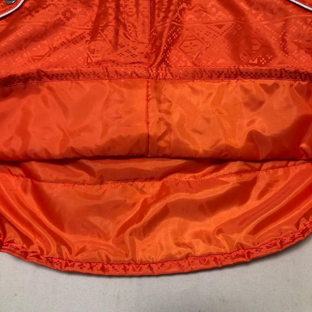 セットアップ マンシングウェア 中綿 パーカー スカート オレンジ 総柄 M