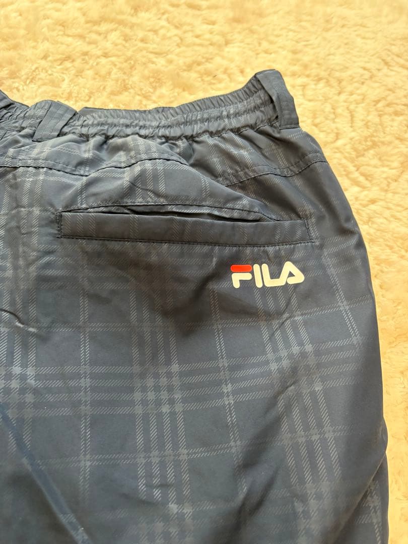 値下げしました　FILA ゴルフウェアセット( L L) 新品ダグ付