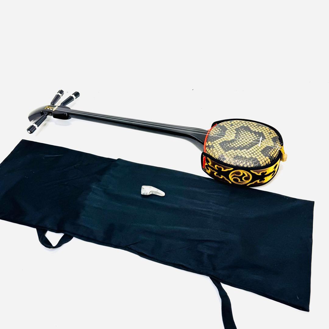 【美品】沖縄三線 人工皮 三味線 合皮 ヘビ皮柄 ケース付属 爪付き