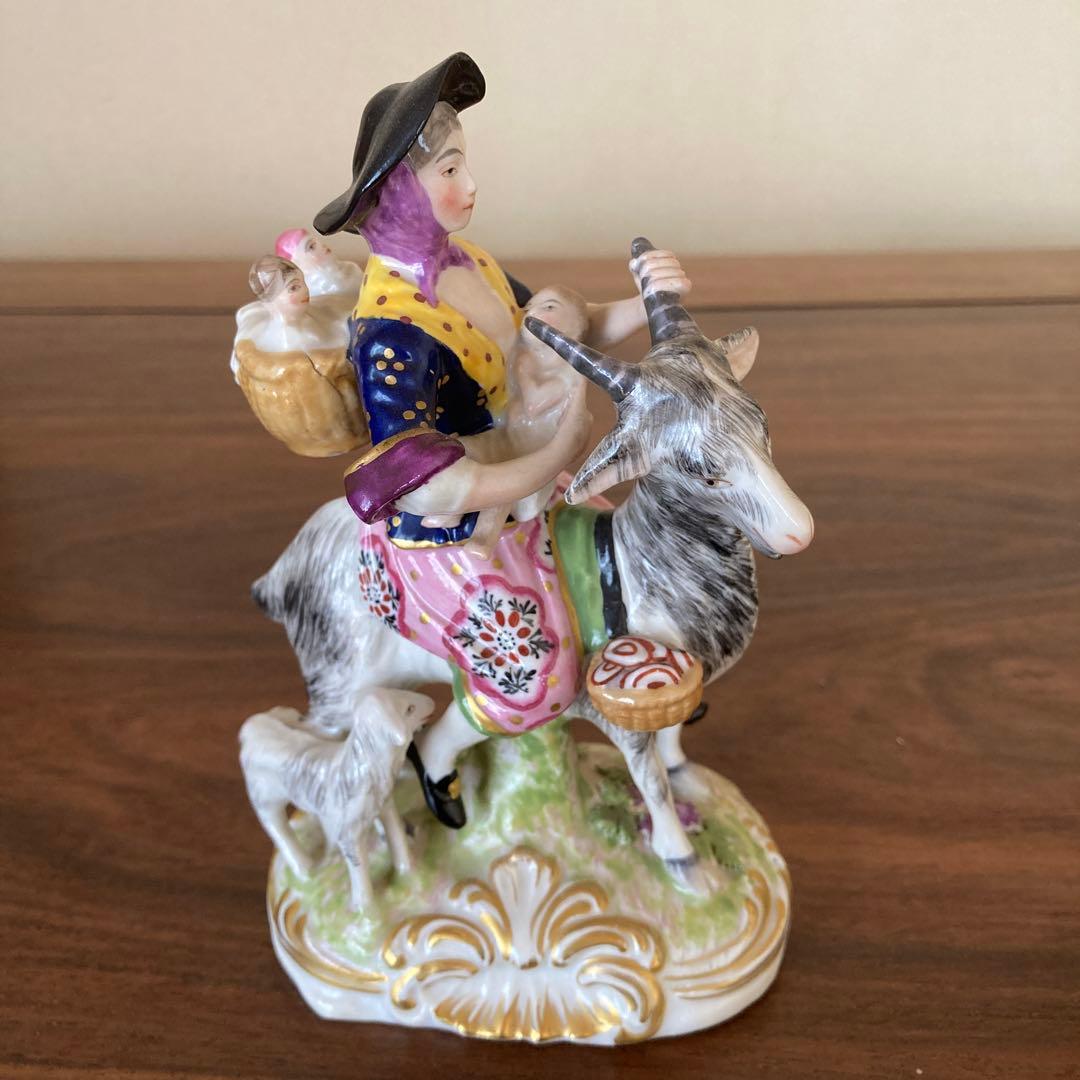 山羊に乗った仕立て屋夫婦 磁器人形 一対