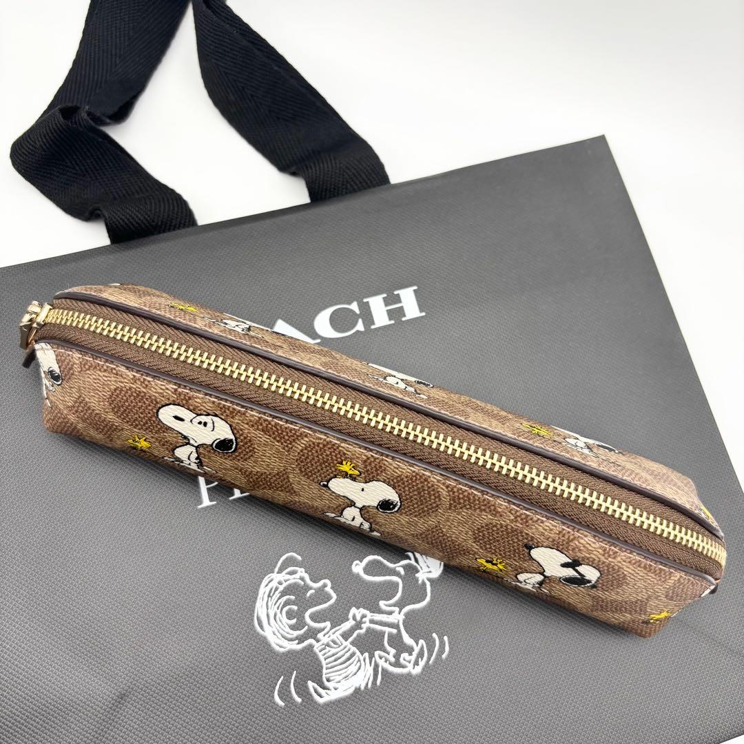 【COACH X PEANUTS】ペンシル ケース！スヌーピー 紙袋付き！