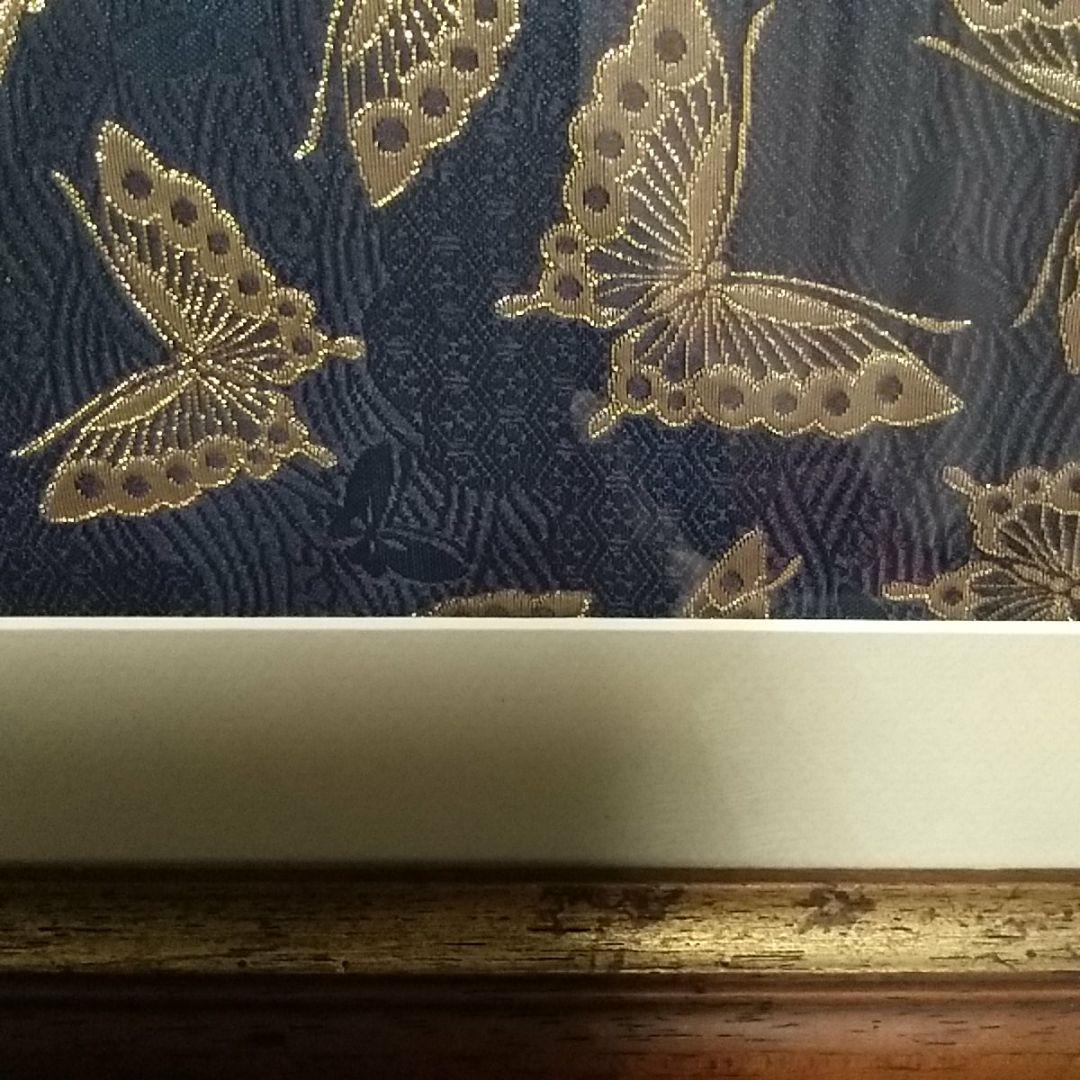 古木額縁に入ってる帯額装