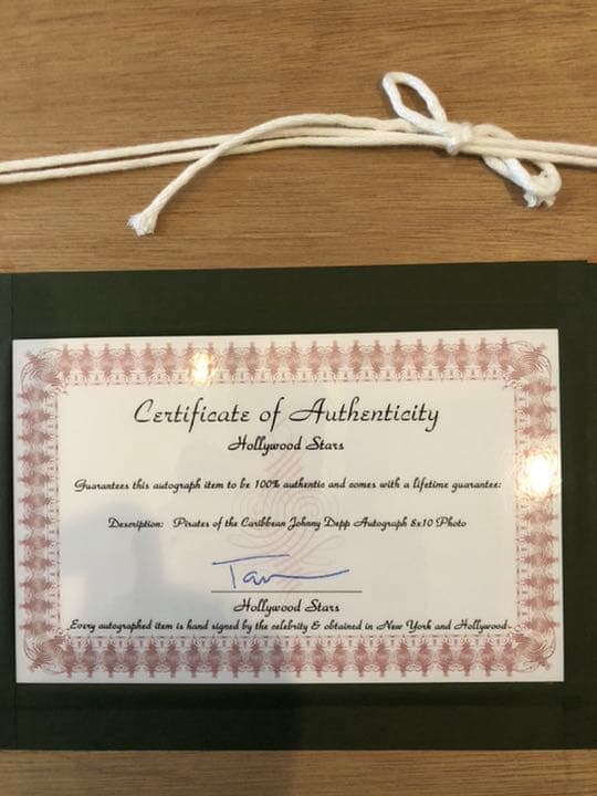 ジョニー・デップ　直筆サイン　写真〔パイレーツ・オブ・カリビアン〕