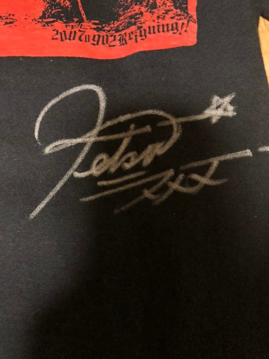 デランジェ サイン入りTシャツ