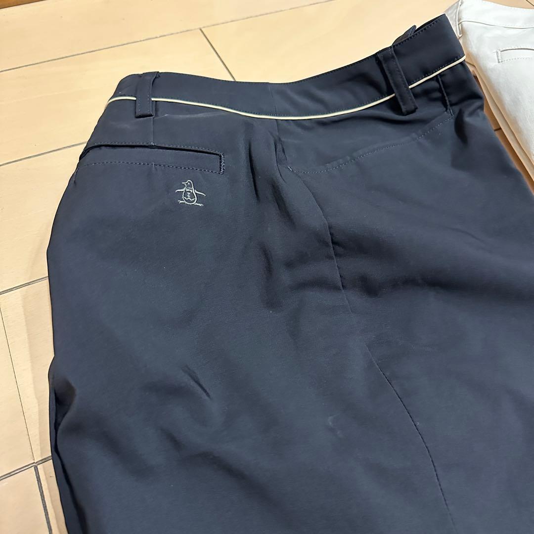 マンシングウェア レディースゴルフパンツ ブラック＆オフホワイト 2点セット