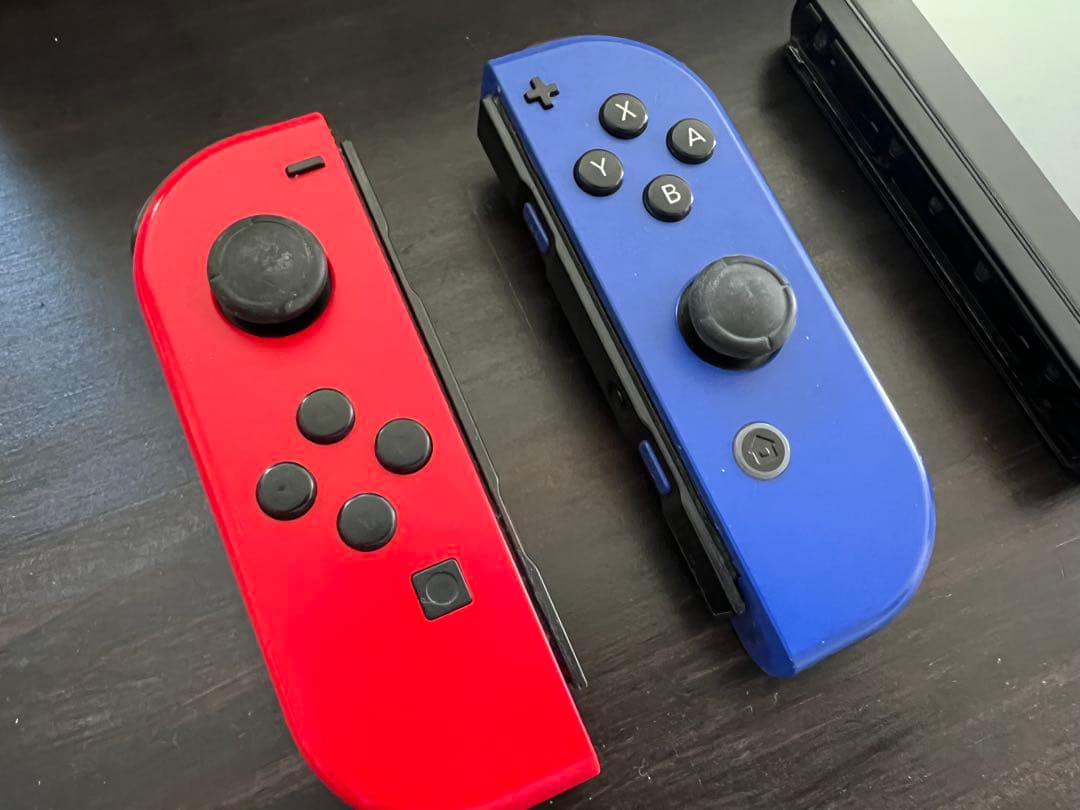 used NintendoSwitch 本体&マリオカートハンドル2つ付き