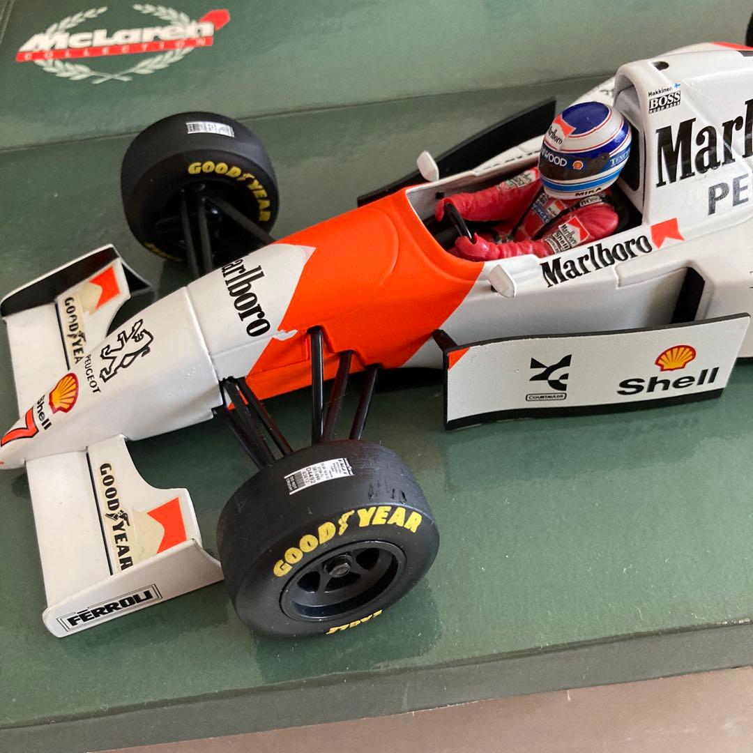ミニカー Marlboro McLaren Peugeot MP 4/9 1/18