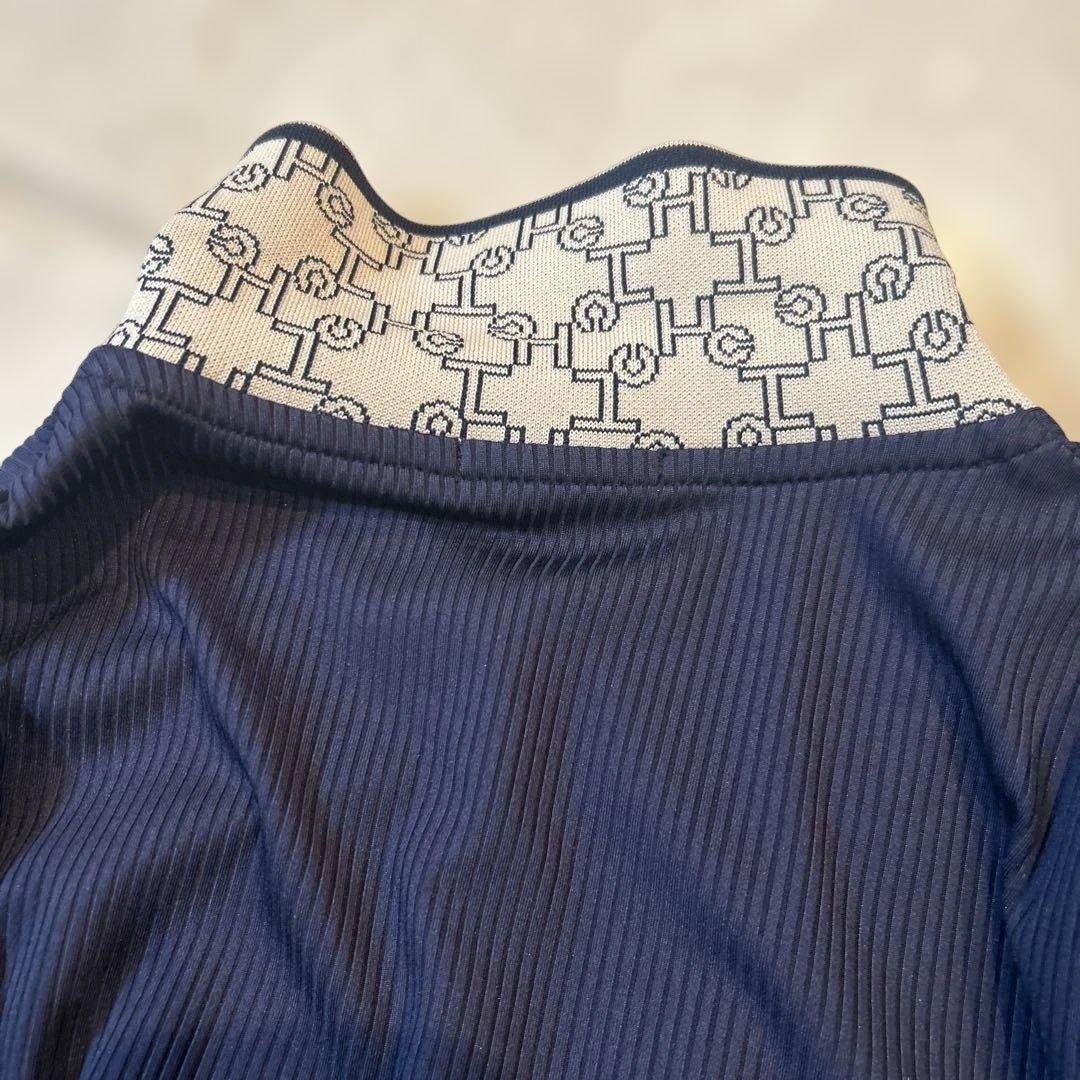 お値段変更ネイビー 幾何学模様 スカート 新品タグ付ゴルフウェアセットアップ