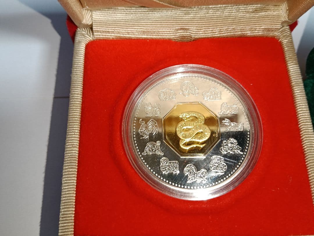 ロ*ン様 中国旧正月シリーズ『巳年』プルーフ銀貨＆カルガリー冬季オリンピック