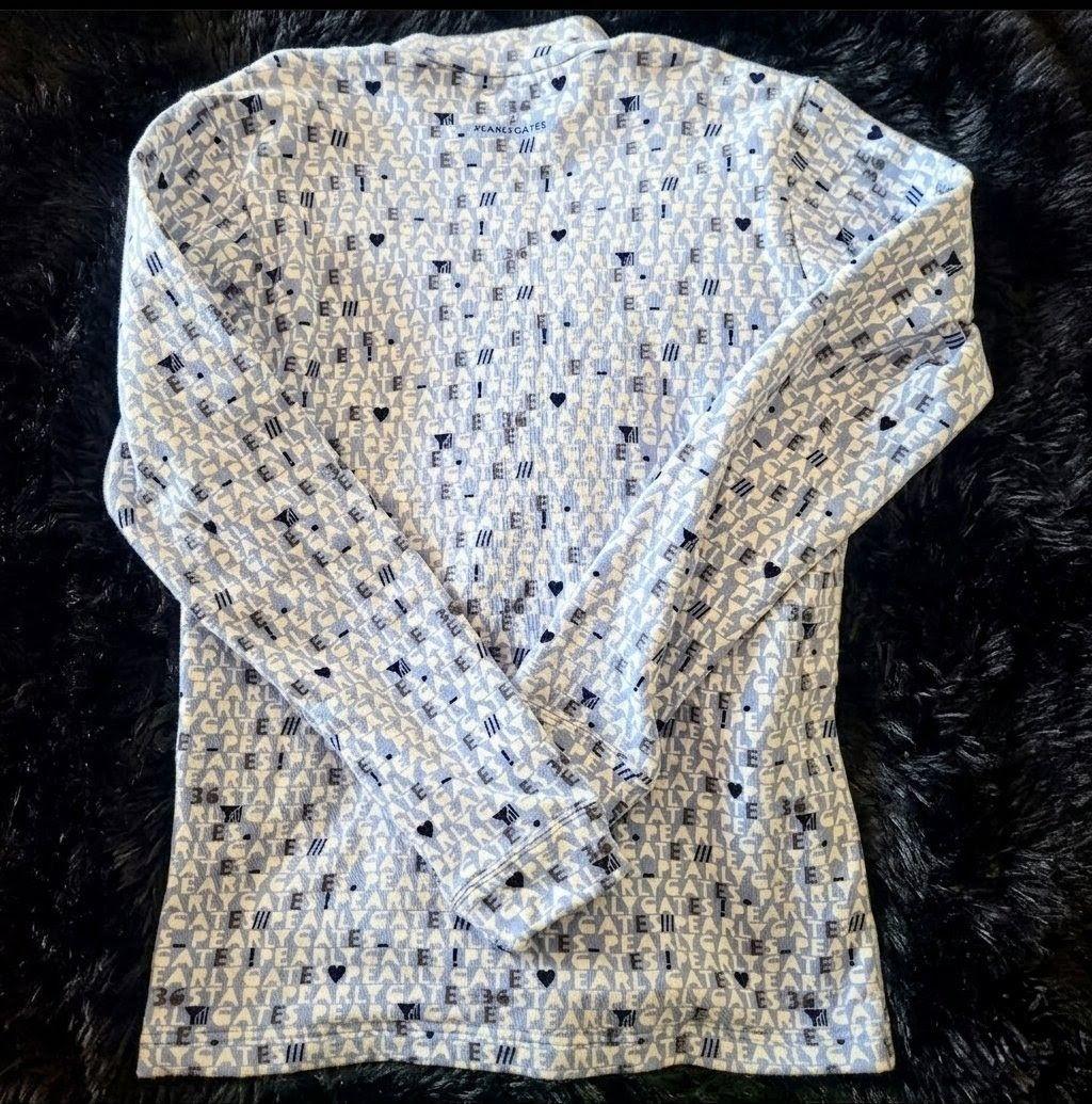 未使用に近い PEARLY GATES モックネックシャツ 水色 サイズ4/M