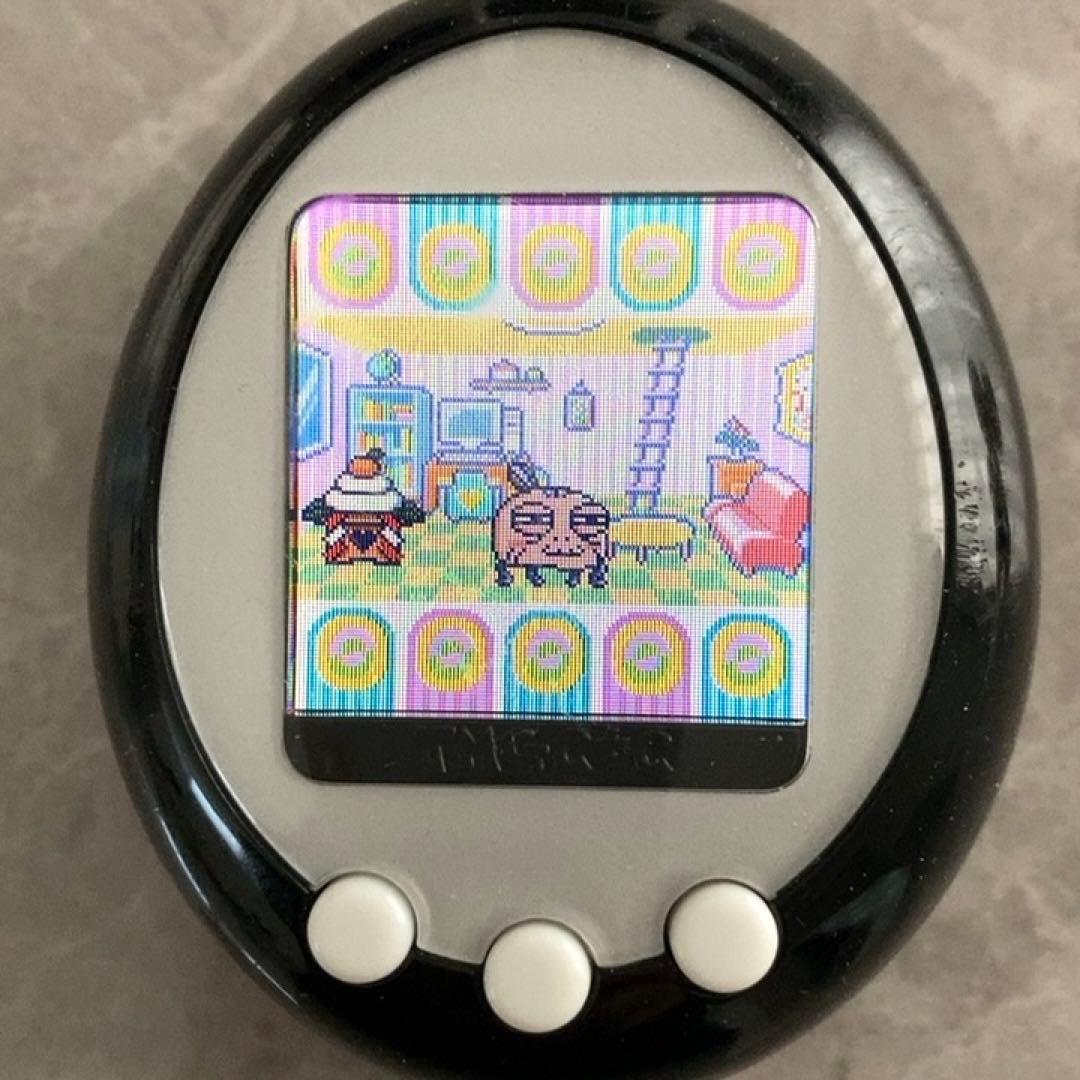 d*9様 Tamagotchi + Color 2008年製　と攻略本、フィギュ