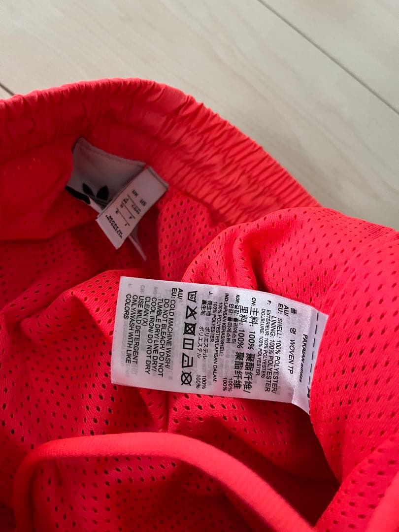 アディダス　サーモンピンク　ロックアップ　ウーブントラック　トレフォイルMサイズ