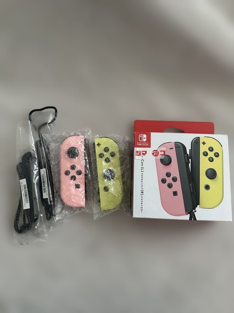 Nintendo Switch 本体 + Joy-Con（ピンク・イエロー)