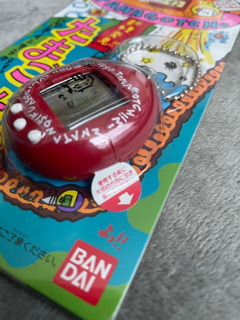 1997年発売たまごっち　「新種発見!! たまごっち赤」 タマゴッチ