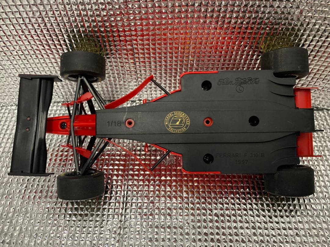 【ミニチャンプス　1997 フェラーリF310B M.シューマッハ　1/18】