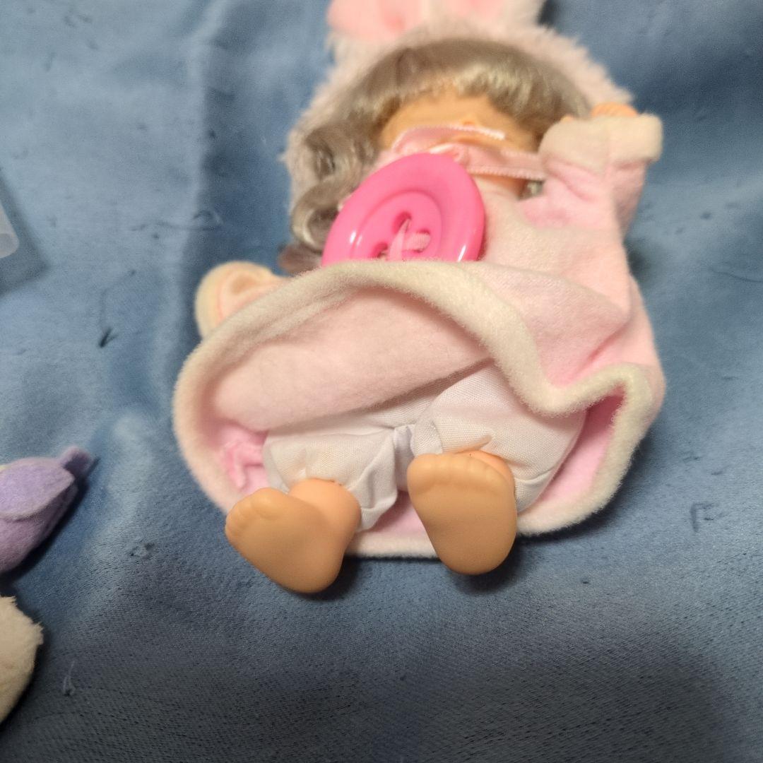 とんがり帽子のメモル 眠り顔のお人形　指しゃぶり人形