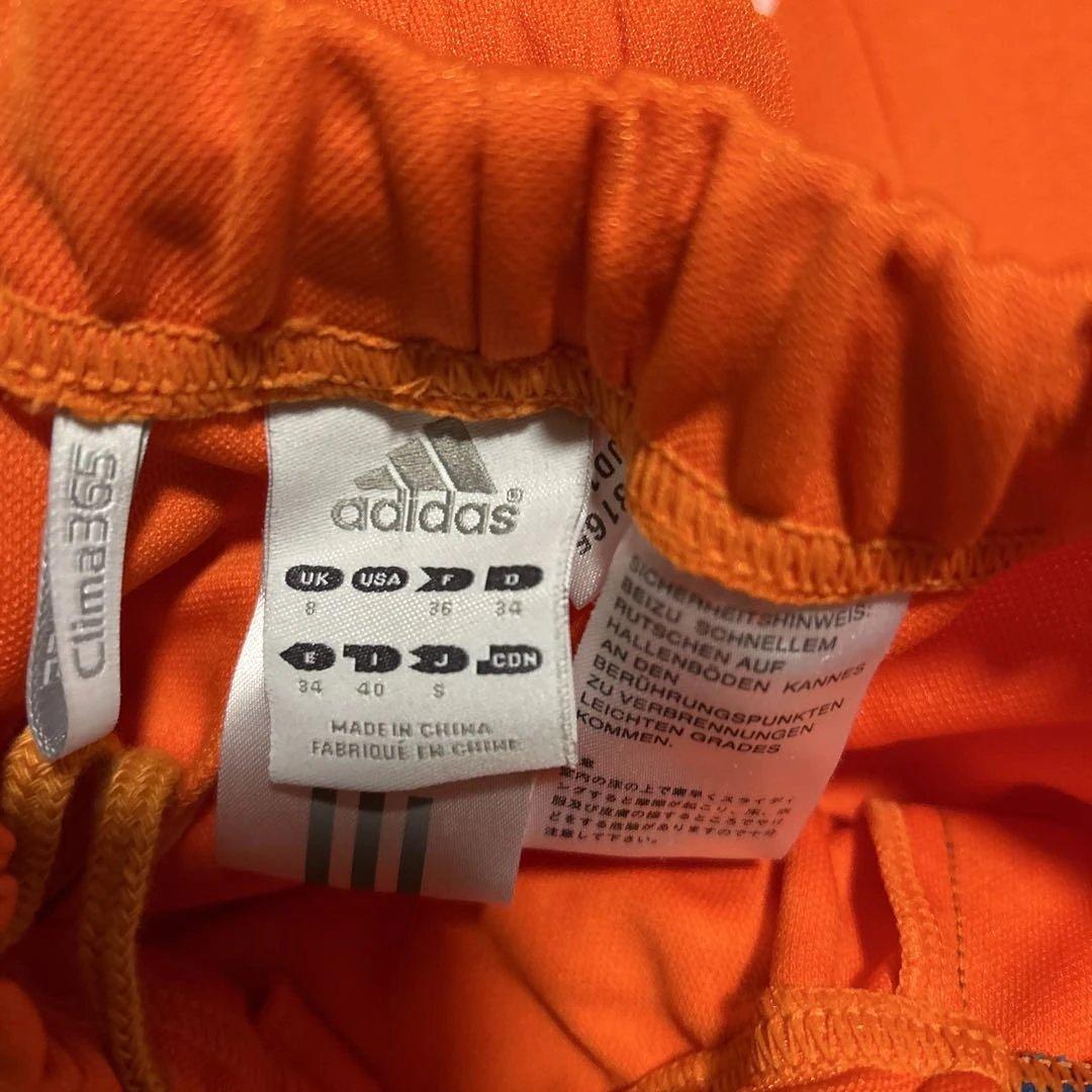 adidas ジャージセットアップ　上下　オレンジ　レディースSサイズ【未使用】