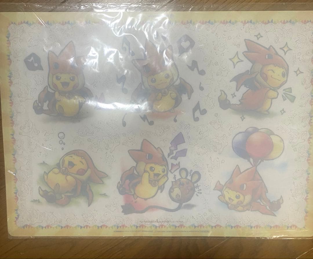 ポケモン メガリザードンYのポンチョに身を包んだピカチュウ クリアポスター