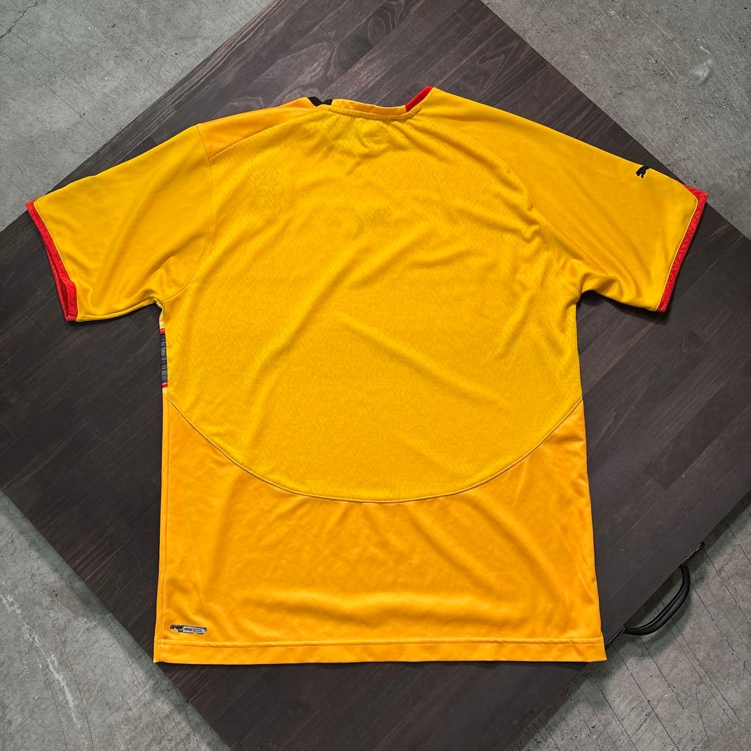 ★8SM2 PUMA 2006 ゲームシャツ　アンゴラ代表　黄色　古着