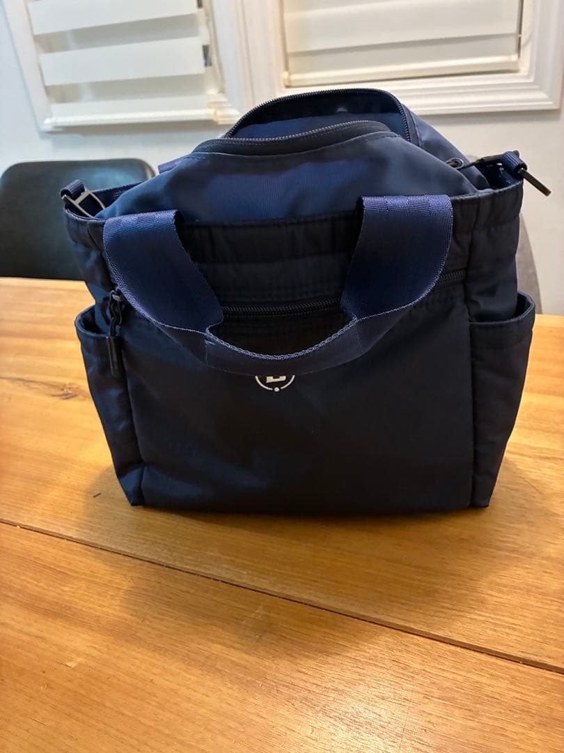 ひ*ー様 BRIEFING ネイビー ラウンドトートバッグ