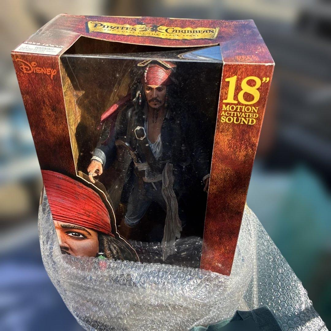 ディズニー パイレーツオブカリビアン ジャックスパロウ フィギュア 新品と小物