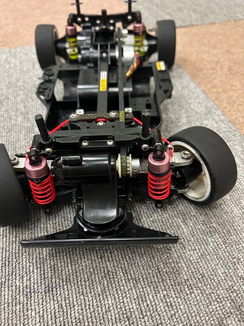 タミヤTA03RS中古シャーシ(オプション、ジャンクパーツ多数)