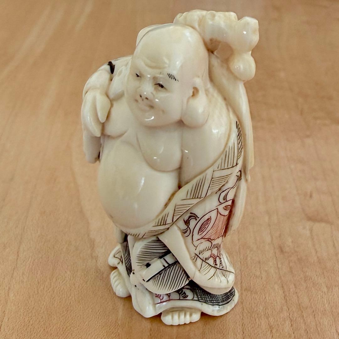 根付　布袋様